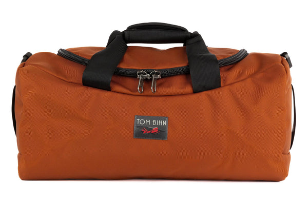 A Medium Yeoman Duffel in Burnt Orange 1050 Ballistic.